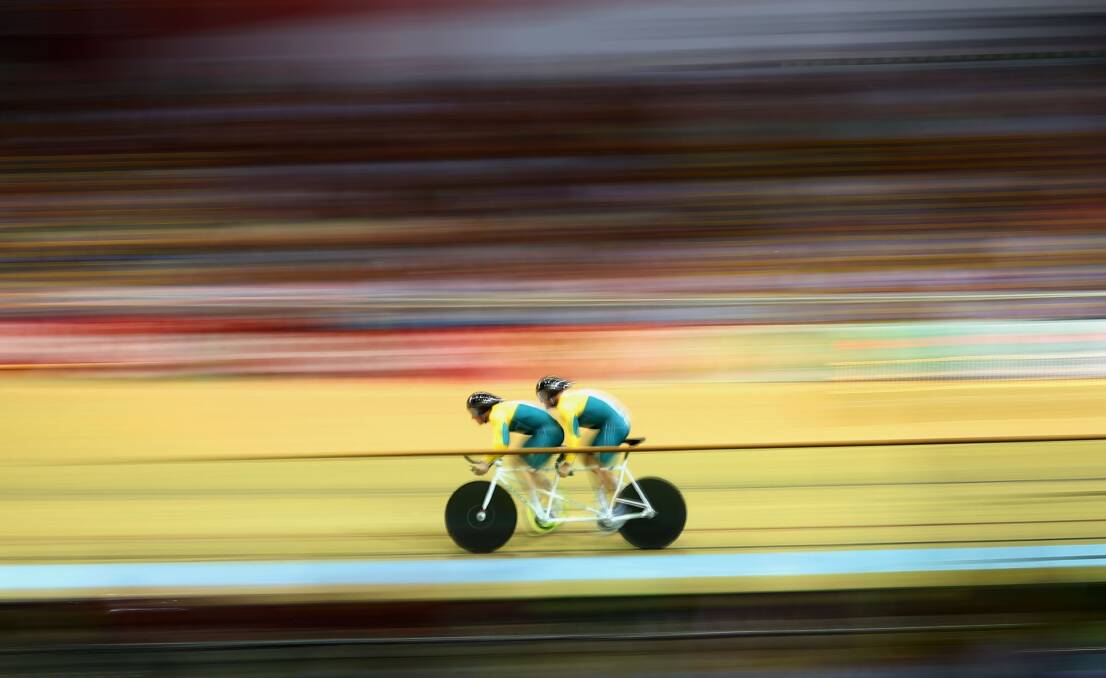 Jason Niblett and Kieran Modra compete during Saturday's time trial at the Commonwealth Games. Picture: GETTY IMAGES