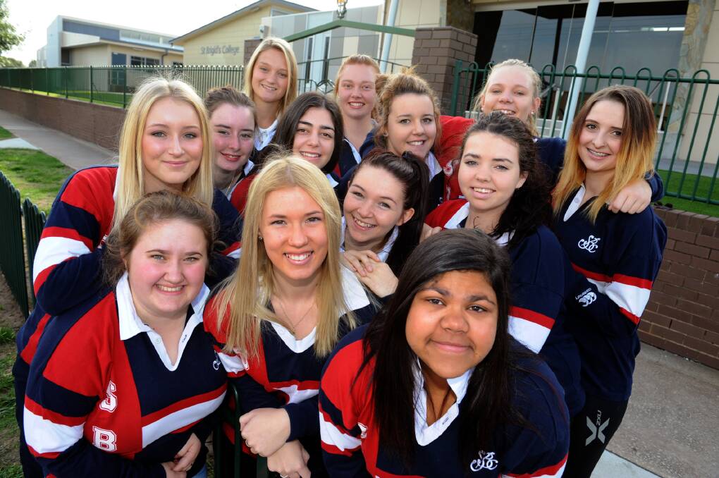 STRONG SUPPORT: St Brigid’s College year 12 students in Horsham have thrown their support behind classmate Cory Panozzo’s final wish. From back left, Mikayla McAuliffe, Danielle Fogarty and Georgia Hall; middle, Taylor Besford, Tayleka Hughes, Remii Luciani, Bridget Arrowsmith, Nat Zietsman and Aimee O’Callaghan; and front, Loretta Martin, Lily Johnson, Tahlia Williams and Kiesha McDonald are ready to help raise money for the Royal Children’s Hospital Good Friday Appeal. Picture: PAUL CARRACHER