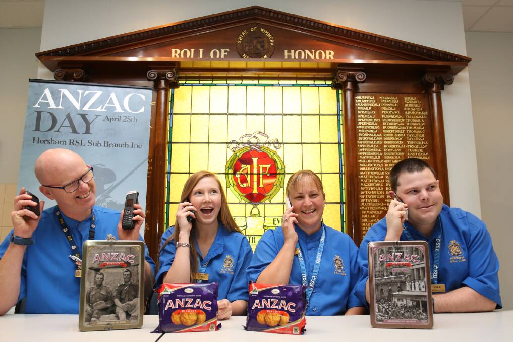 THE SOUND OF SILENCE: Horsham RSL staff Noel Whiteside, Emily Wall, Nicole Drendel and Kyle Hobbs prepare to sell a minute of silence over the phone for Anzac Day. Picture: THEA PETRASS