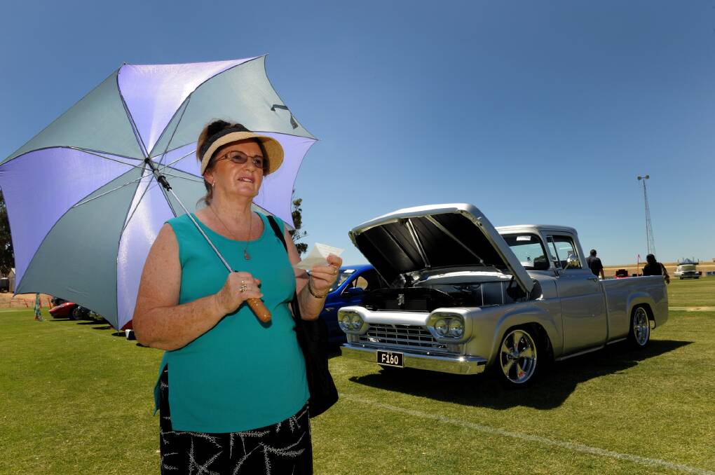 Heather Austin, Kaniva, picking her favourite car for people's choice at Kaniva Car and Bike Show.