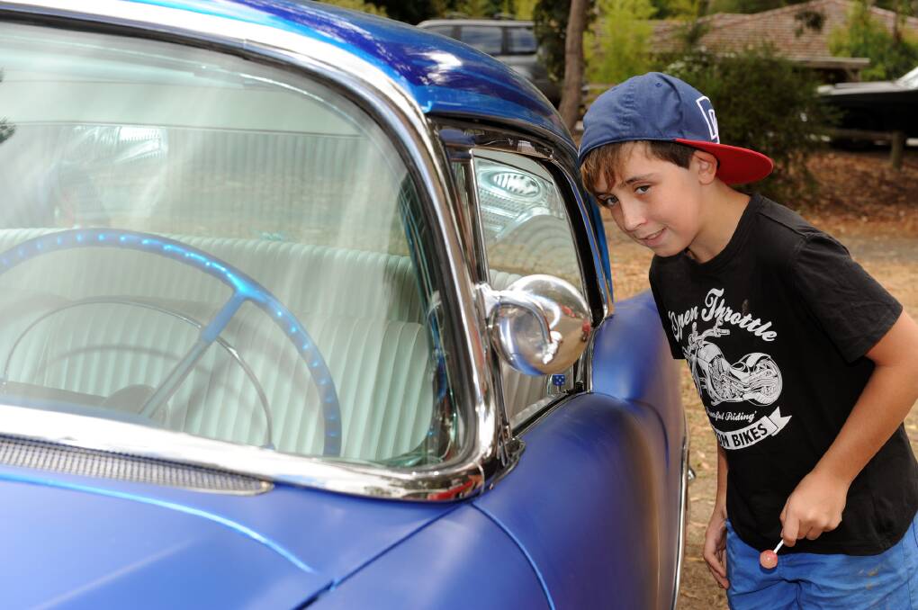NEVER TOO YOUNG: Stawell's Trey Howat, 11, at the Old Skool Hotrod and Custom Club show and shine at Halls Gap.