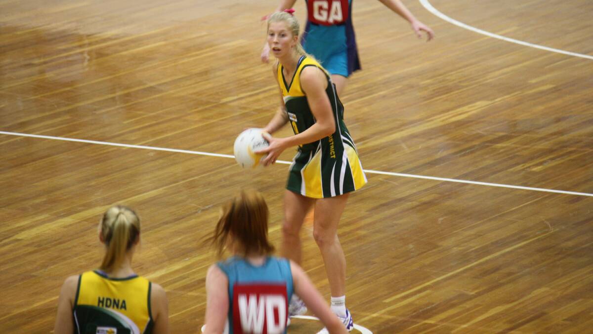 IN ACTION: Horsham District Football Netball League’s Emily Langley looks for options during Sunday’s Netball Victoria Association Championships in Melbourne. Picture: CONTRIBUTED