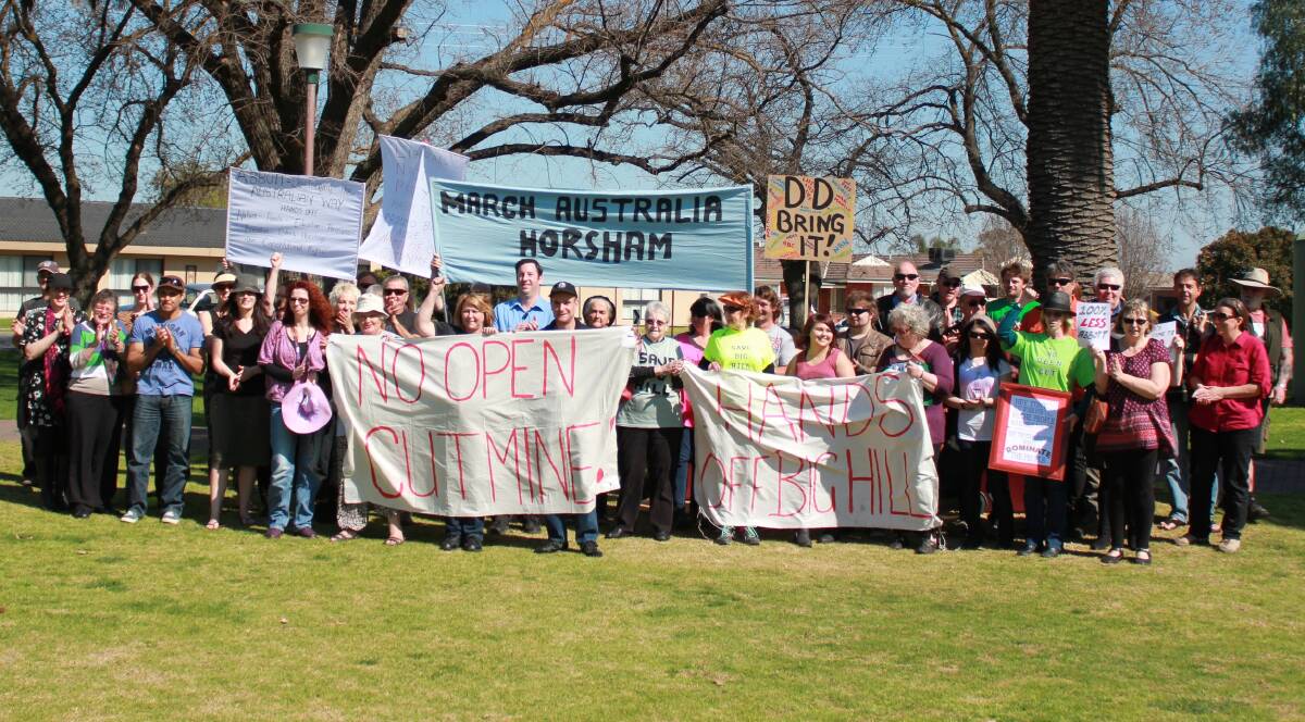 TAKING A STAND: More than 50 people protest Federal Government policies at a rally in Horsham on Saturday. 