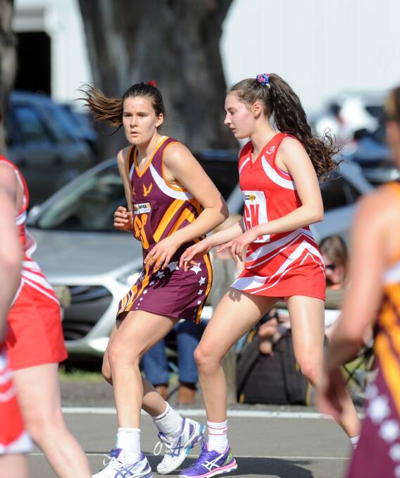 KEY PLAYER: Warrack Eagles shooter Summer Schultz, left, pictured playing in the Eagles’ A Grade preliminary final victory on Sunday, will look to continue her outstanding season on Saturday. Picture: PAUL CARRACHER