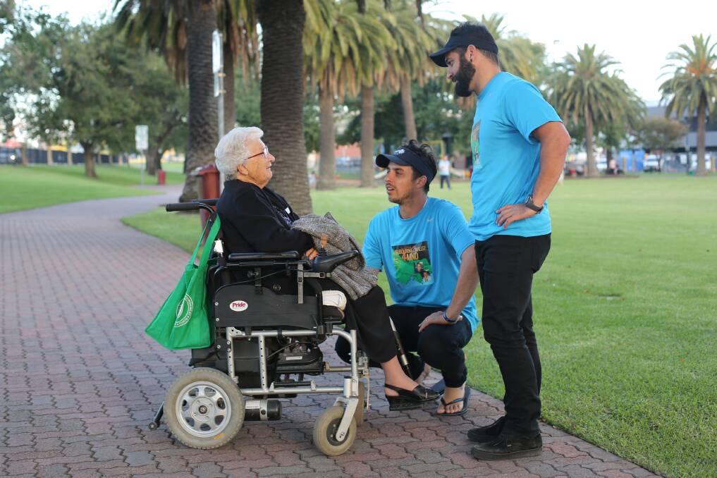 HOPETOUN-BOUND: Melbourne to Mallee motor neurone disease fundraisers Matt Sofoulis and Tim Solly chat with raffle ticket seller Fay Allan in Horsham on Tuesday. Pictures: THEA PETRASS