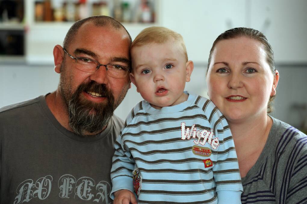 HELPING HAND: Dean Parish and Naomi Pearce with their son Casen Parish, who suffers from anorectal malformation. The family stays at Ronald McDonald House in Melbourne when Casen receives  treatment at the Royal Children's Hospital. Picture: PAUL CARRACHER