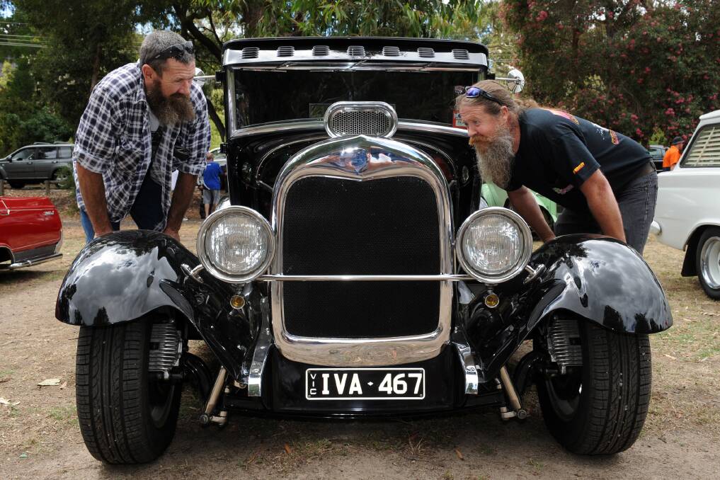 MATES: Stawell's Les Crouch and Dale Baker at the Old Skool Hotrod and Custom Club show and shine on Sunday.
