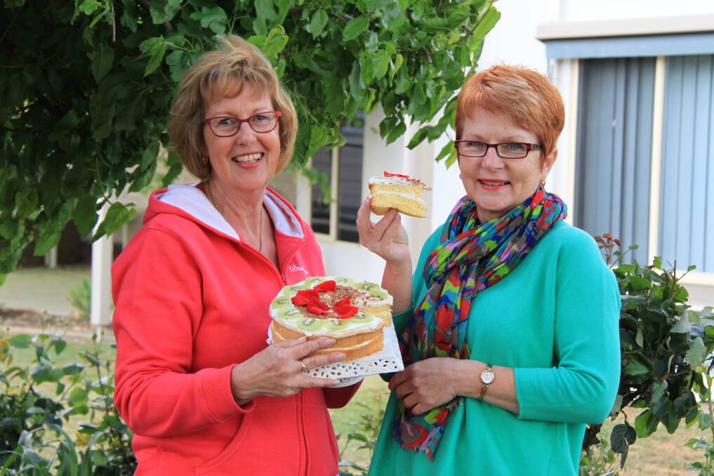 LET THEM EAT CAKE: Beulah Historic Learning and Progress Association secretary Barb Moore and finance manager Jean Donaldson need the Wimmera and Mallee to vote for their community project.