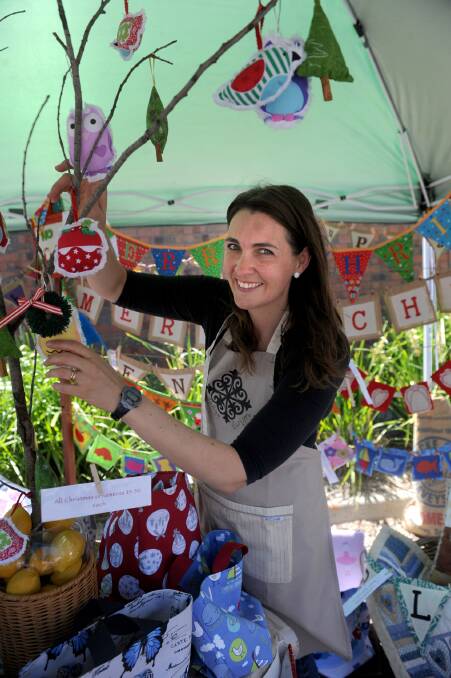 DECEMBER: Narelle Bubb with her Jabez Design stall at the Makers Gallery Christmas market.