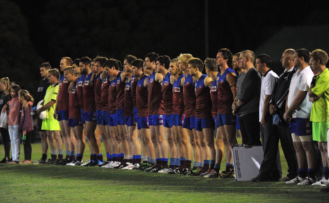 Horsham Demons line up before the Anzac Day clash.