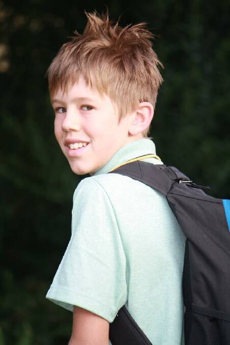 Saxon Hobbs, 12, on his first day of secondary school at St Brigid's College in Horsham.