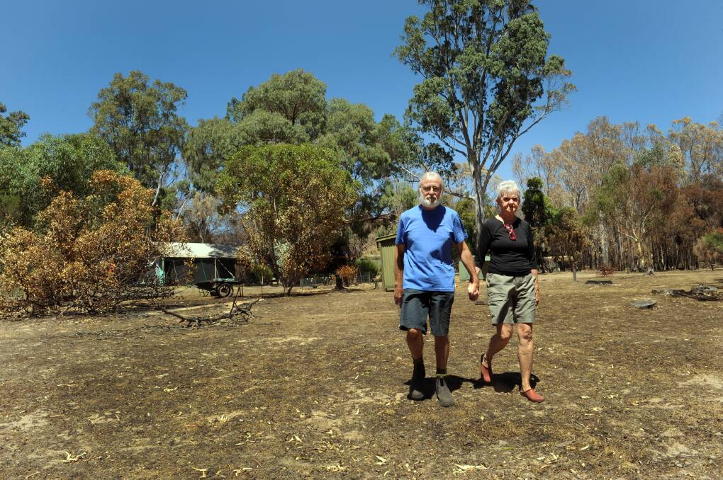 FIGHTING SPIRIT: Roses Gap residents Tony and Jean Swan believe someone was looking down on them after their property was largely untouched by January's bushfires.