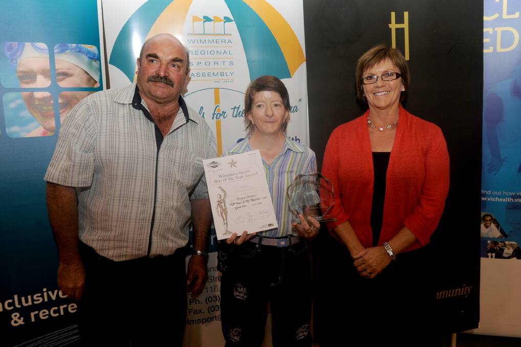 ACCESS FOR ALL ABILITIES SPORTS STAR: Wimmera Regional Sports Assembly chairman Jeff Pekin and Denise Leembruggen, right, present Maureen Cameron with the local award.