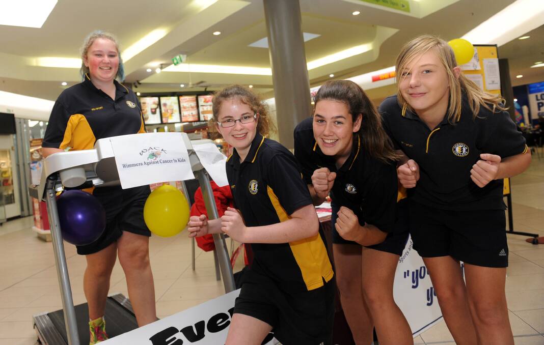 STEPS FOR CANCER SUPPORT: Horsham College year nine students Louise Crouch, Emily Olston, Hayley Mills and Tiana Eldridge walk to raise money for Wimmera Against Cancer in Kids. Picture: SAMANTHA CAMARRI