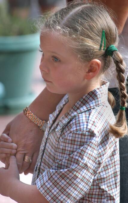2004: New prep Baylee Miller nervously holds mum Sue's hand at Ss Michael and John's Primary School in Horsham.