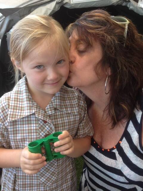 New Ss Michael and John's Primary School prep Isabella Mitton gets a good luck kiss from her Nonna Cathy Bamford.