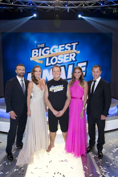TEAMWORK: The Biggest Loser: Challenge Australia 2014 champion Craig Booby, centre, with, from left, trainers Steve 'Commando' Willis and Michelle Bridges, host Hayley Lewis and trainer Shannan Ponton.