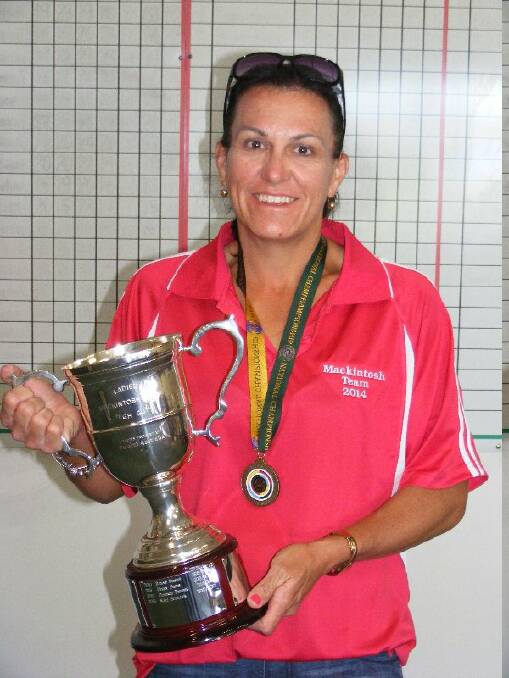 SUCCESS: Lisa Hawker displays the Mackintosh team overall women’s trophy she won as the best female shooter at the national championships in Wagga Wagga. Picture: CONTRIBUTED