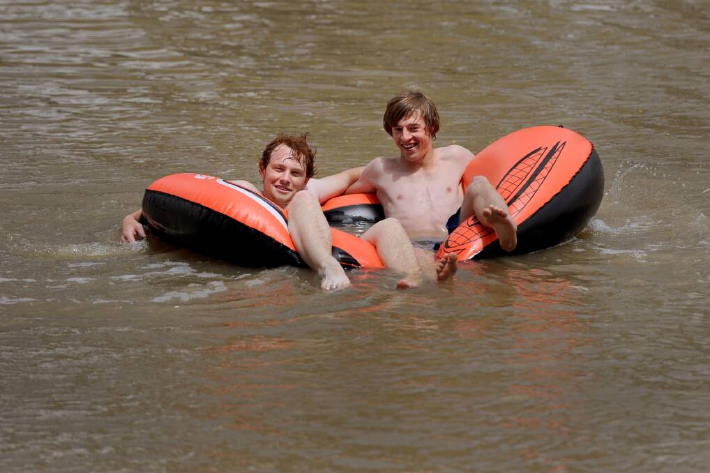 DECEMBER: Brad Little and Jake Carter, Horsham, keep cool in the Wimmera River near the Horsham Soundshell.
