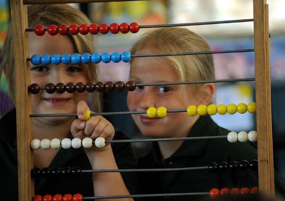 2009: Maddison Price and Jessica McMaster use an abacus at Jeparit Primary School.