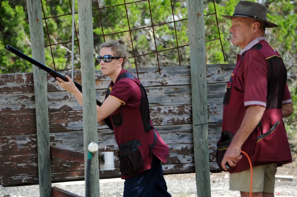 Jess Rissmann takes aim as David Rissmann releases the target at Natimuk Field and Game's national side-by-side shotgun titles. Pictures: PAUL CARRACHER