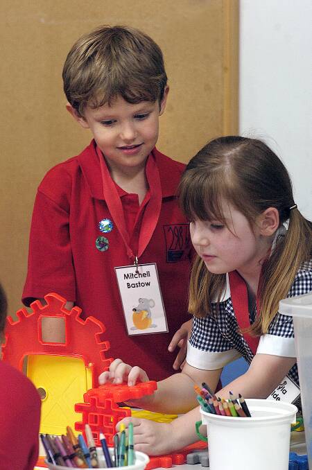 2008: Mitchell Bastow and Tayla Wilde work on a project on their first day of prep at Horsham 298 Primary School.