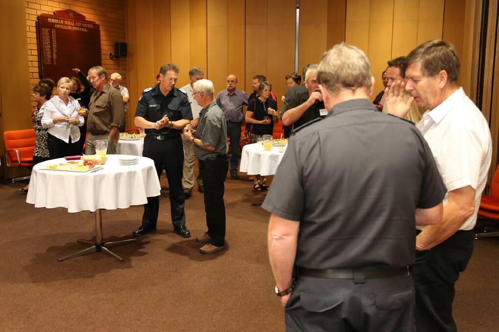 Guests mill at a Grampians bushfire civic reception on Tuesday.