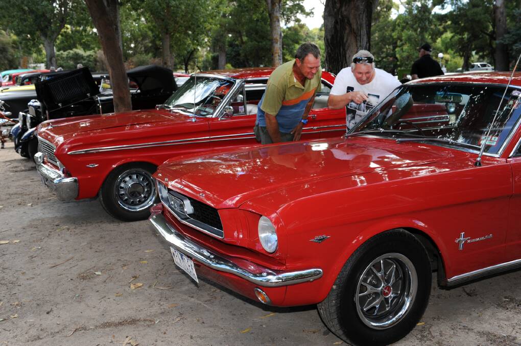 ADMIRATION: Horsham's Craig Zaal and Luke Wissell admire a car at Sunday’s Old Skool Hotrod and Custom Club show and shine at Halls Gap.