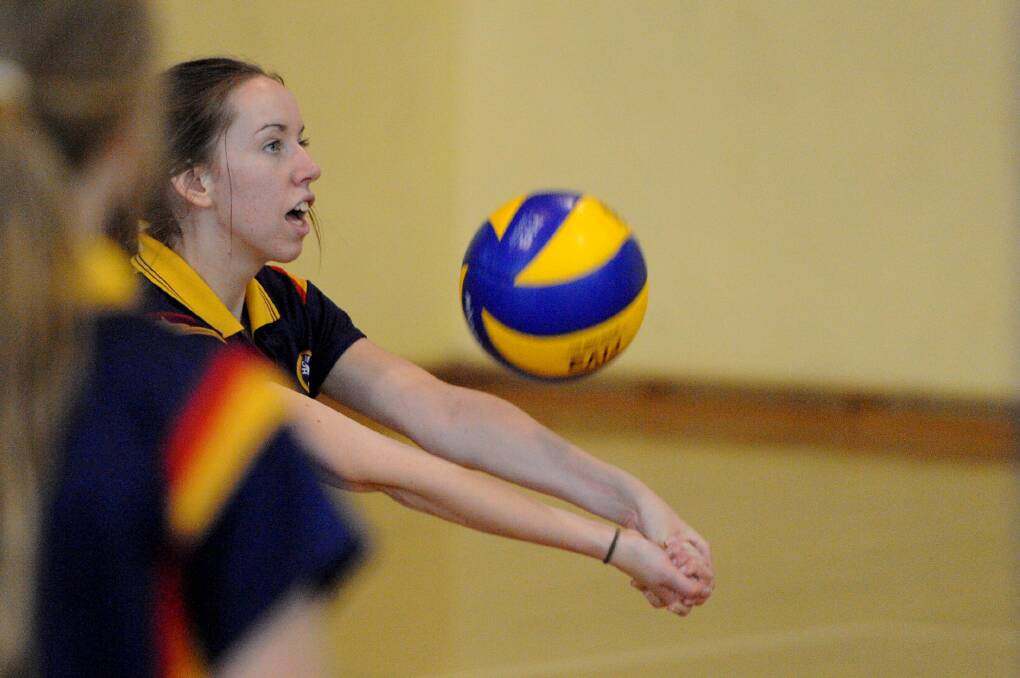 DIG: Horsham College's Steph Milton digs the ball during Tuesday's tournament.