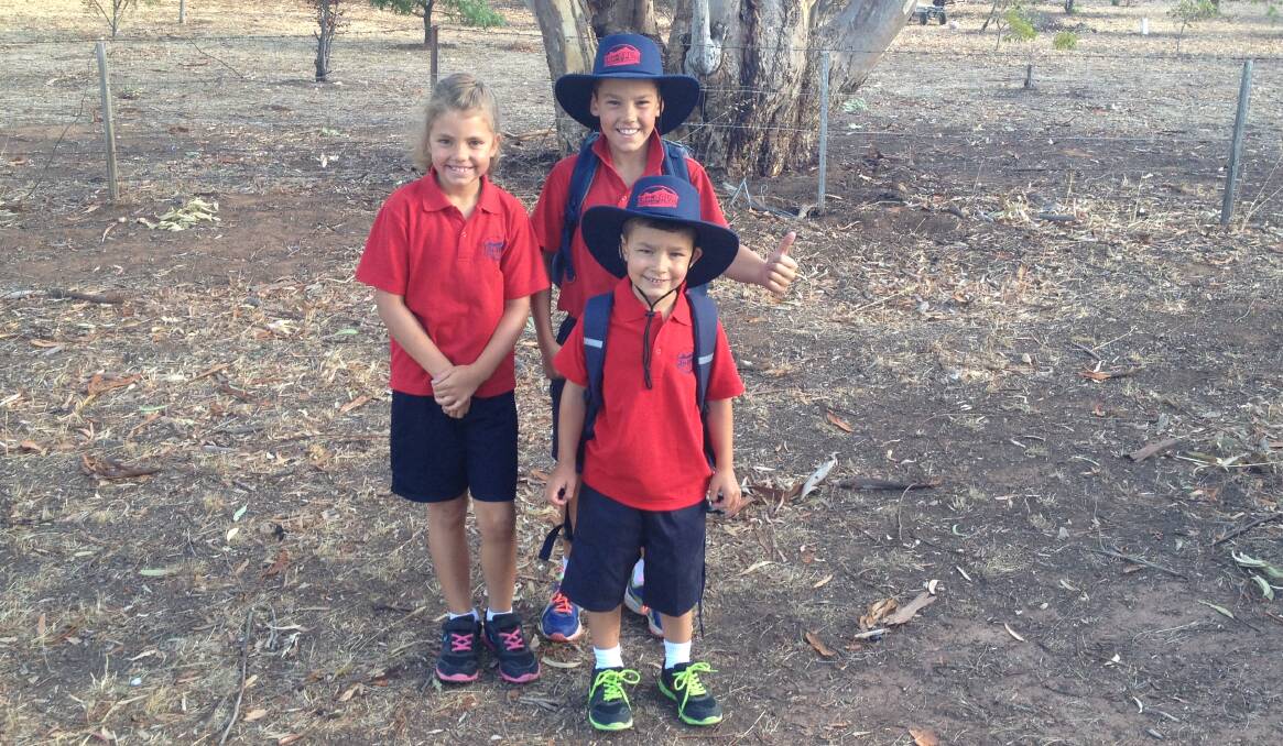 Georgie, Cooper and Jed Tyler get ready for their first day back at school.