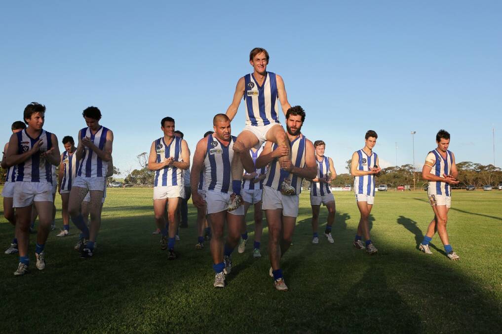 MILESTONE MAN: Walpeup-Underbool’s Darren Latta is chaired from the ground after playing his 300th senior game against Woomelang-Lascelles at the weekend.