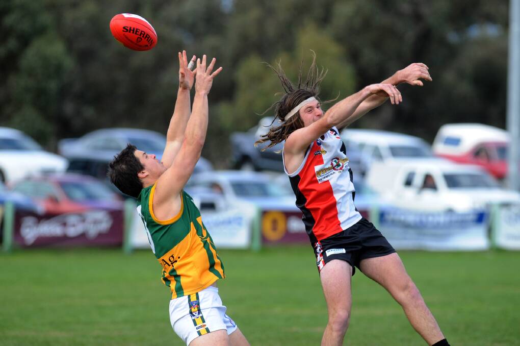 FLAG HOPE: Horsham Saint Harry McLennan, pictured playing against Dimboola earlier this year, hopes his side gets over the line on Saturday. Picture: PAUL CARRACHER