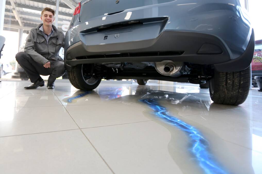 Tristan Cameron from Morrow Motors encourages people to buy cars with the new autor emergency braking system fitted. Picture: THEA PETRASS
