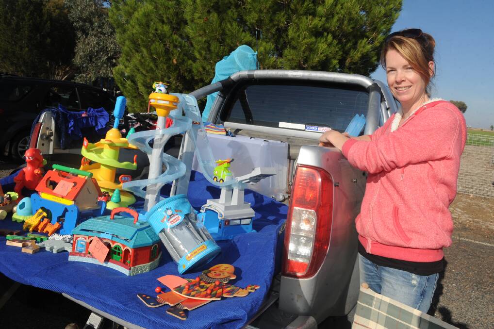 FULL TO THE BRIM: Kalkee's Andrea Mills at the Horsham West Primary School car boot sale.