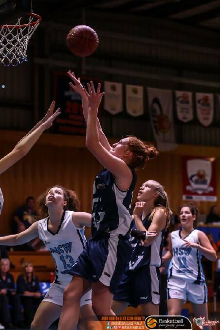 SILVER MEDALLIST: Chloe Bibby in action at the under-18 Australian Junior Championships in Canberra. Bibby led Vic Country to the grand final but the team fell short against Vic Metro, losing 75-70. Picture: BASKETBALL AUSTRALIA