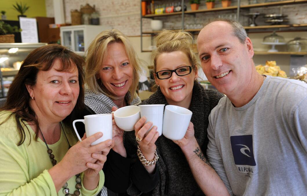 CUPPA FOR A CAUSE: Café Chickpea owner Lyn Witney-Drum, Business Horsham executive administrator Wendy Mitchell, Café Jas owner Sharron Keating and Fig Tree Café owner Brad Koenig raise a glass for CafeSmart, which raises money for tackling homelessness through coffee sales. All three cafes will donate $1 from each coffee sale to the initiative on Friday. Picture: PAUL CARRACHER