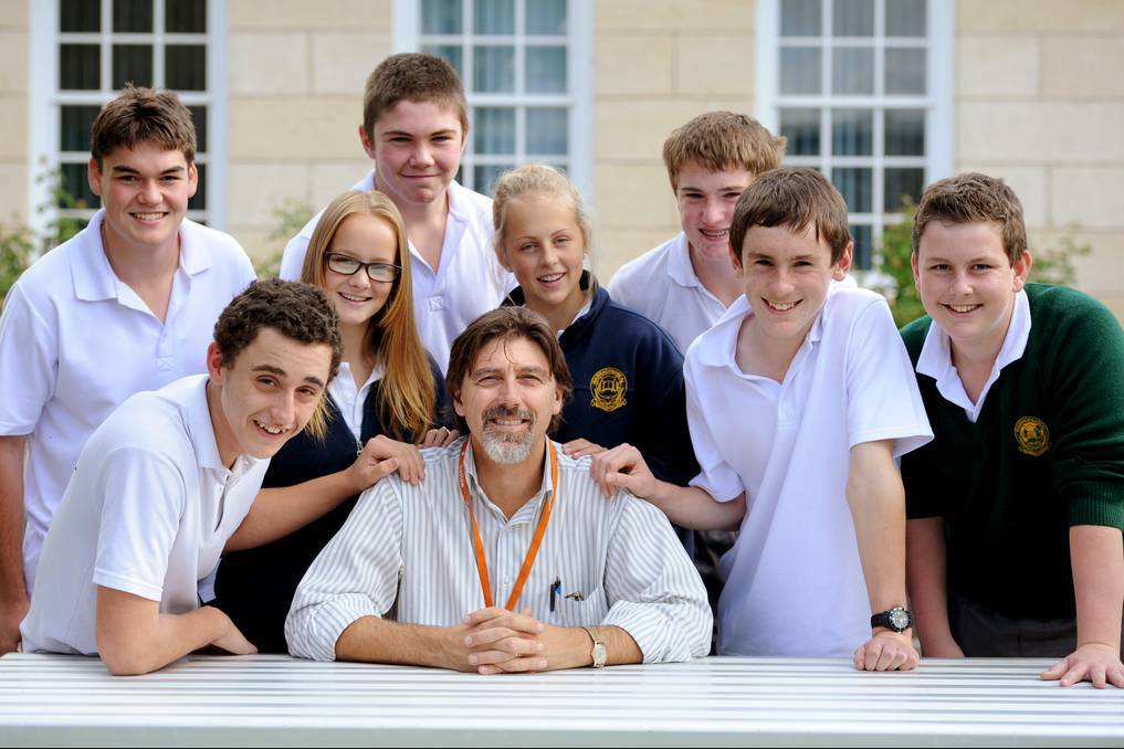 GLOW OF SUCCESS: Warracknabeal Secondary College students with principal Tony Fowler. Picture: SAMANTHA CAMARRI