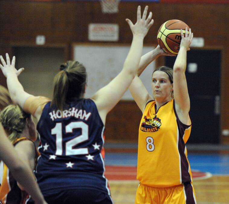 SHOT: Stawell's Michelle Beaton, guarded by Caitlin Story. Picture: PAUL CARRACHER
