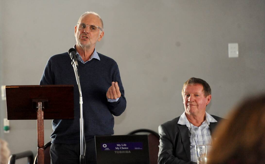 CONTROVERSIAL: Pro voluntary euthanasia advocate Philip Nitschke addresses the Wimmera Association of Independent Retirees at Horsham RSL on Friday. He is pictured with association chairman Lyall Wheaton. Picture: SAMANTHA CAMARRI