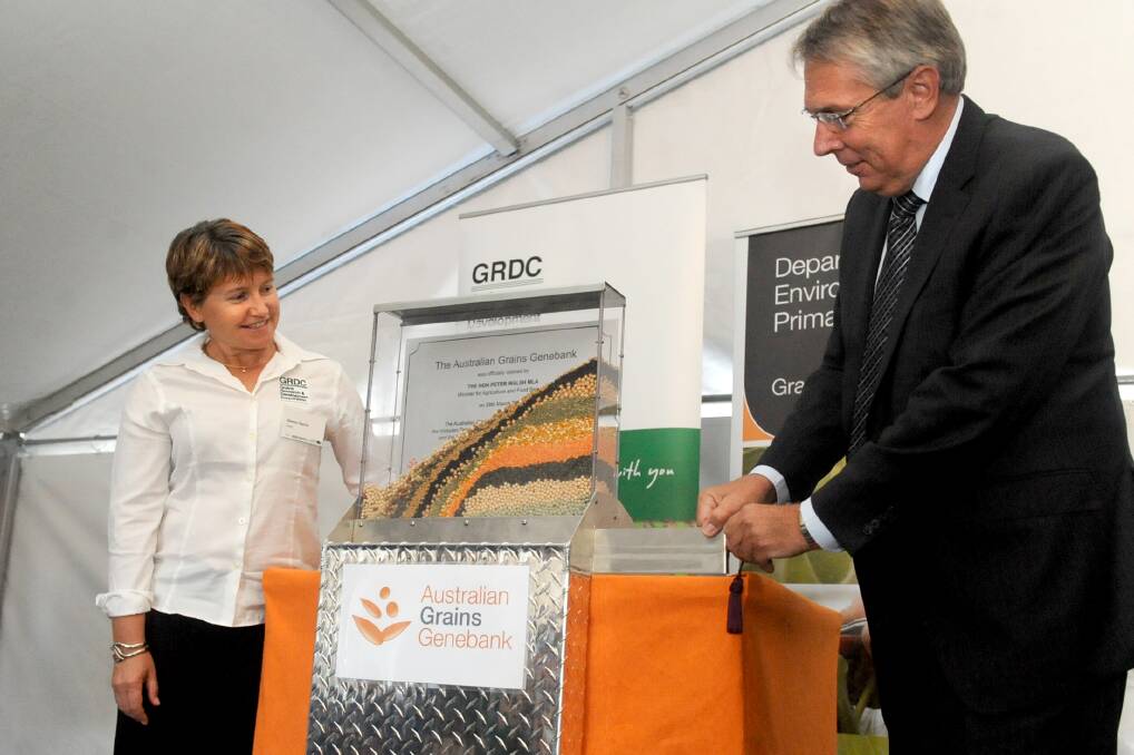 IN ACTION: Grains Research and Development Corporation director Sharon Starick with Agriculture and Food Security Minister Peter Walsh, revealing the plaque at the opening of the Australian Grains Genebank. Picture: SAMANTHA CAMARRI
