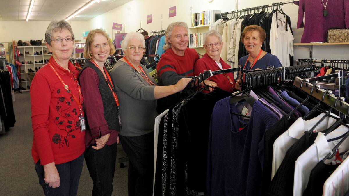 CELEBRATING A CENTENARY: Horsham Red Cross Shop volunteers Anne Kuhne, Caroline Gray, Gladys Bell, Stephen Pettett, Dianna Johnson and Ruth Walter continue the organisation’s work. Picture: SAMANTHA CAMARRI