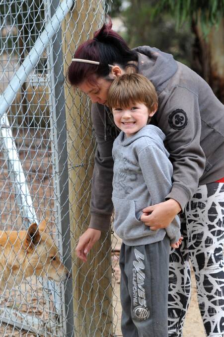 ALL SMILES: Kaleb Young, 6, is all smiles with Ashley Fischer at the Halls Gap Zoo at the weekend.