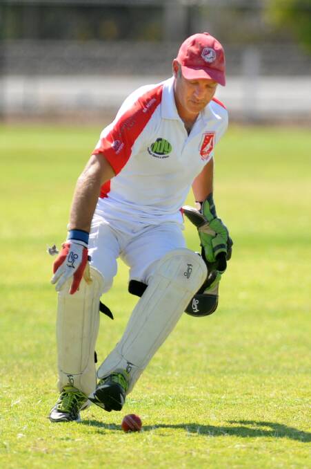 Homers' wicketkeeper Stuart Johns during the Jung Tigers v Homers C Grade grand final.
