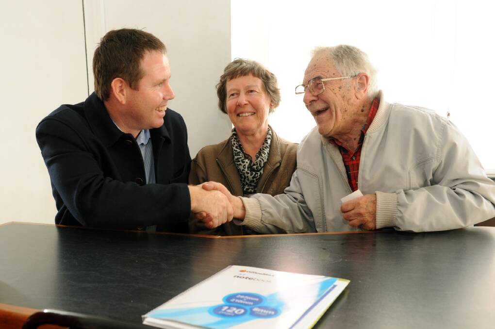 FACING THE ELECTORATE: Member for Mallee Andrew Broad meets Lorraine and Don Freckleton at Fig Tree Cafe in Horsham on Wednesday as part of a meet-and-greet tour of his electorate. Picture: PAUL CARRACHER