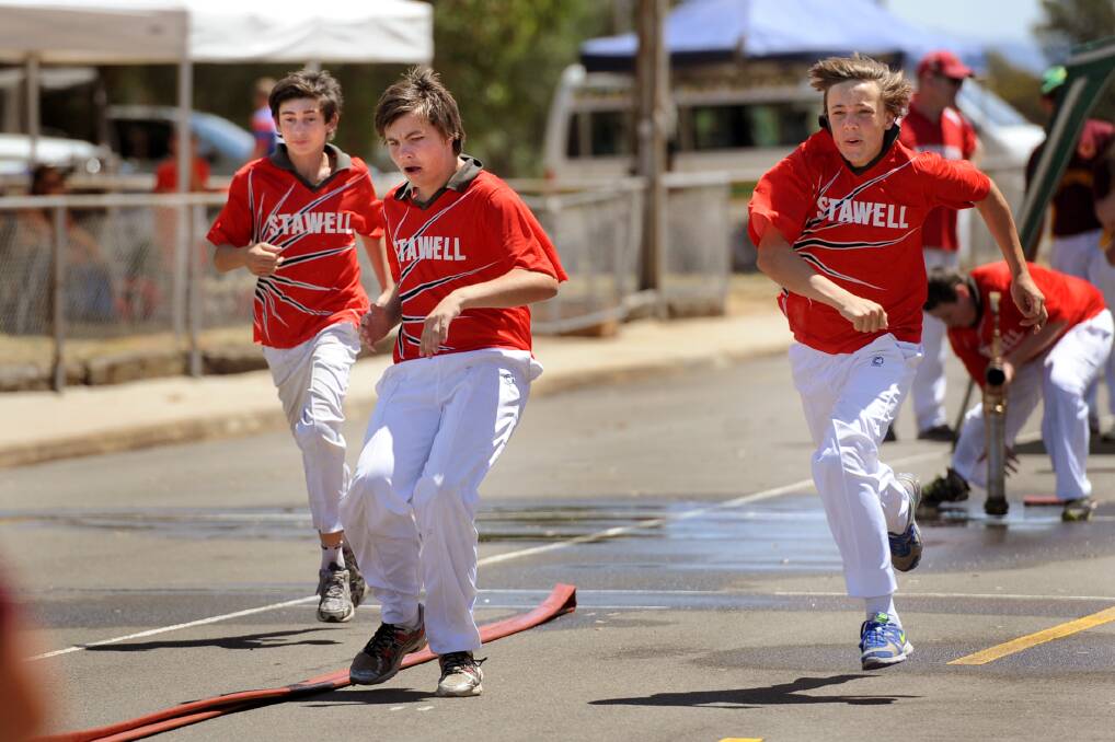 Alex Dolton, Nick Newton and Corey Prydderch of Stawell compete in a junior event at the CFA District 17 Marshal Day.