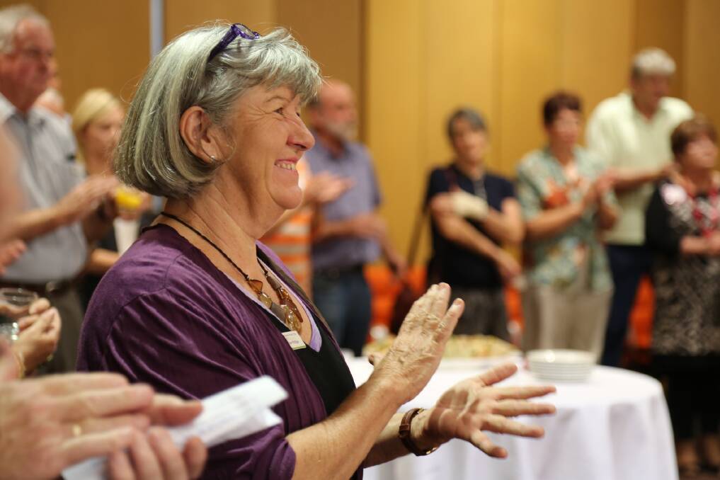 Horsham councillor Heather Phillips celebrates with volunteers at a Grampians bushfire civic reception on Tuesday.