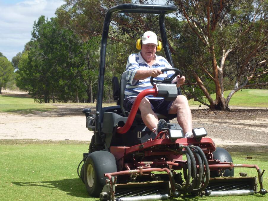 Nhill Golf Club life member John Hobday rolls up his sleeves and lends a hand with course preparations ahead of the club’s annual tournament next week.