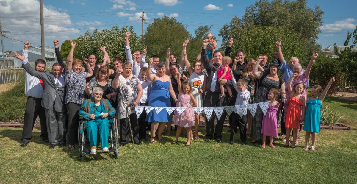 NEWLYWEDS: Sarah and Rodney O'Shannessy with their families. Pictures: LYNTON BROWN