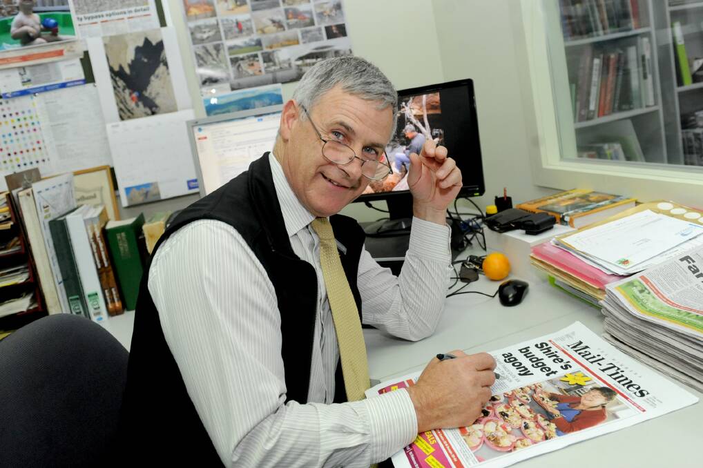 Sub-EDITOR: Keith Lockwood pictured at his desk earlier this year. Picture: SAMANTHA CAMARRI