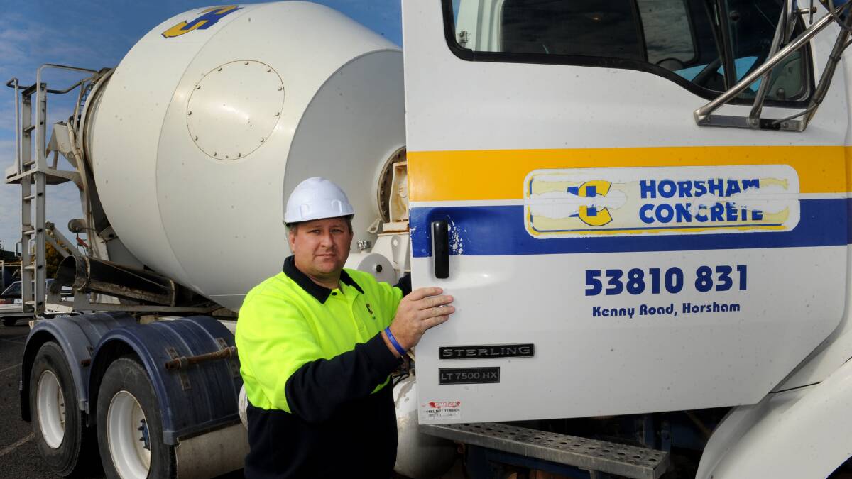 Horsham's Chris Jorgensen is back in a truck after a near fatal truck crash in February last year. He helped pour the first slabs of concrete for the Horsham Aeromedical Transfer Station this week. Picture: PAUL CARRACHER